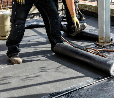 modified bitumen roofing being installed 