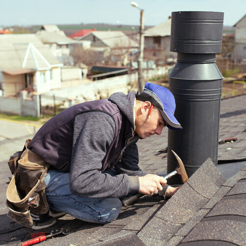 commercial roof being repaired