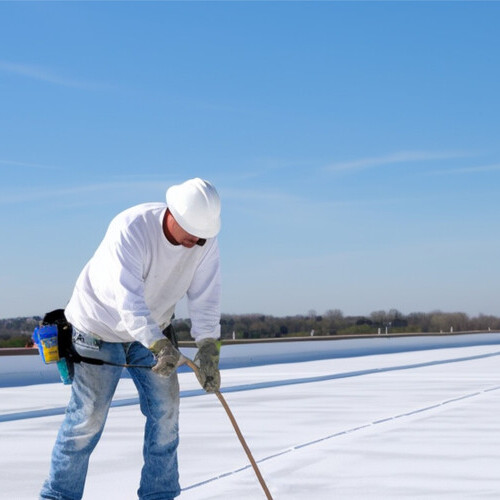 man applying a new silicone roof coating